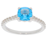 Cushion-cut blue topaz ring in sterling silver, featuring a sparkling gemstone and elegant band design.